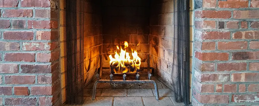 Repairing Damaged Fireplace Tiles in St John, Indiana